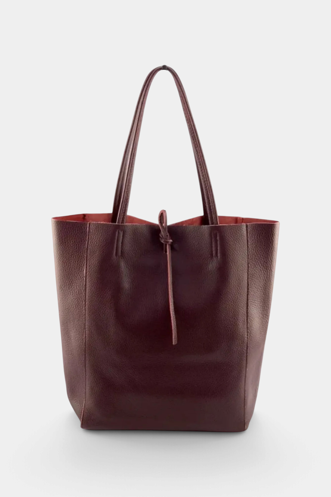 The Copper Shed Italian leather tote bag in deep burgundy with a tie closure and interior pocket