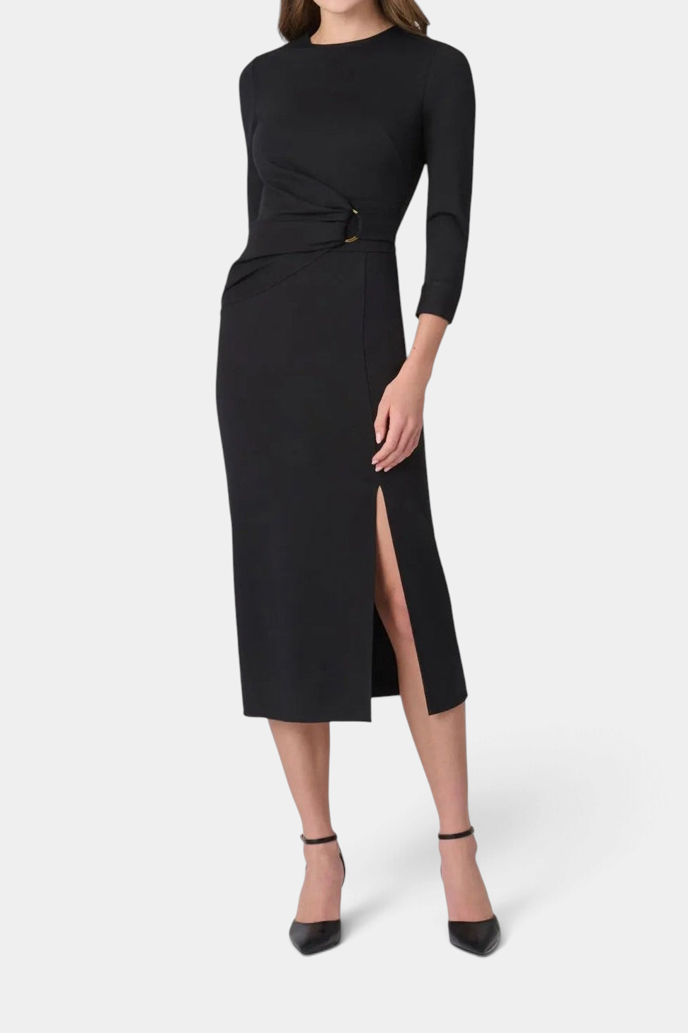 The Copper Shed Cara midi dress in black with three-quarter sleeves, waist draping, gold ring detail, and front slit.