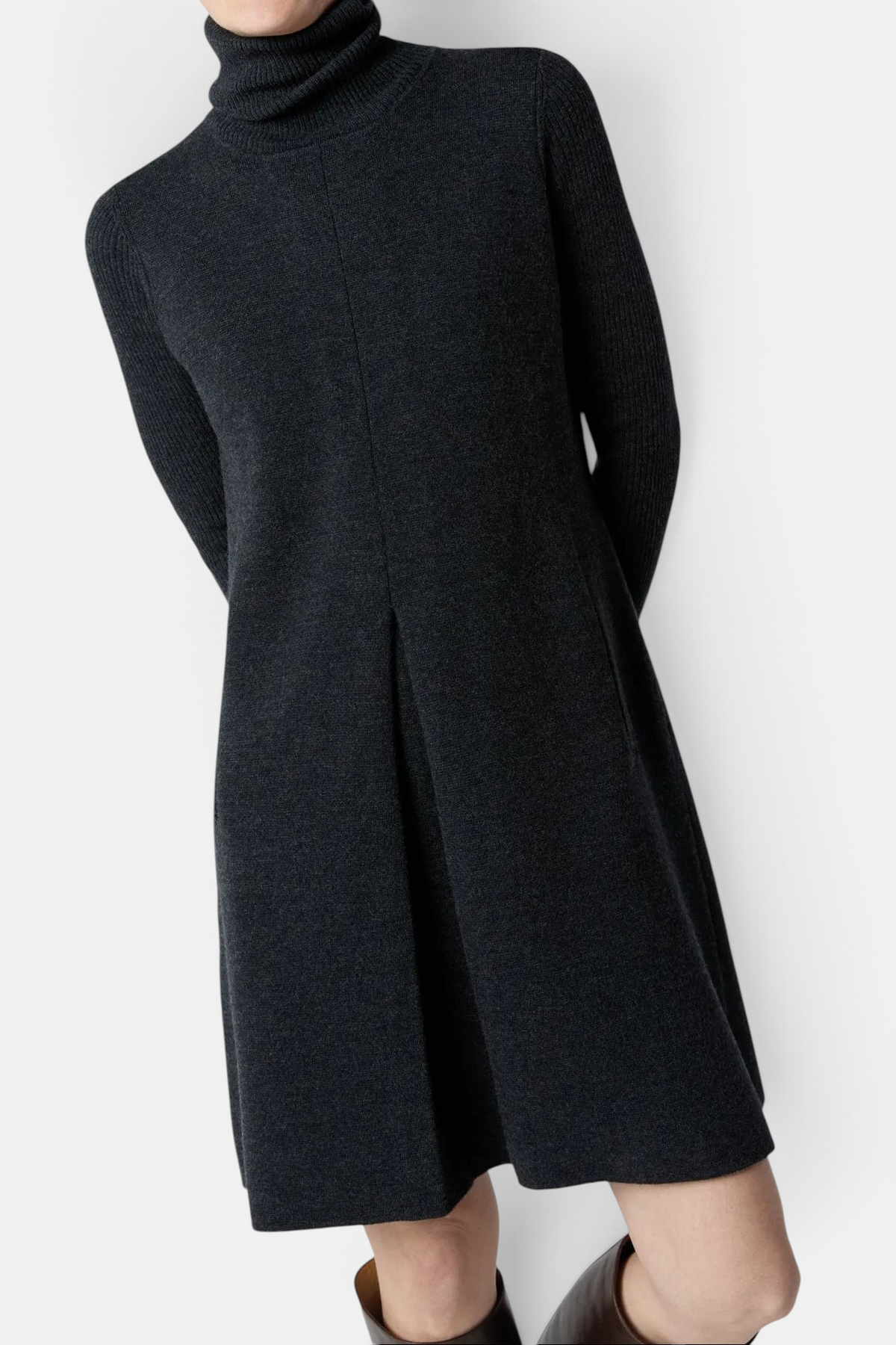 The Copper Shed Fosette charcoal grey merino wool sweater dress with a funnel neck and back view of inverted pleat