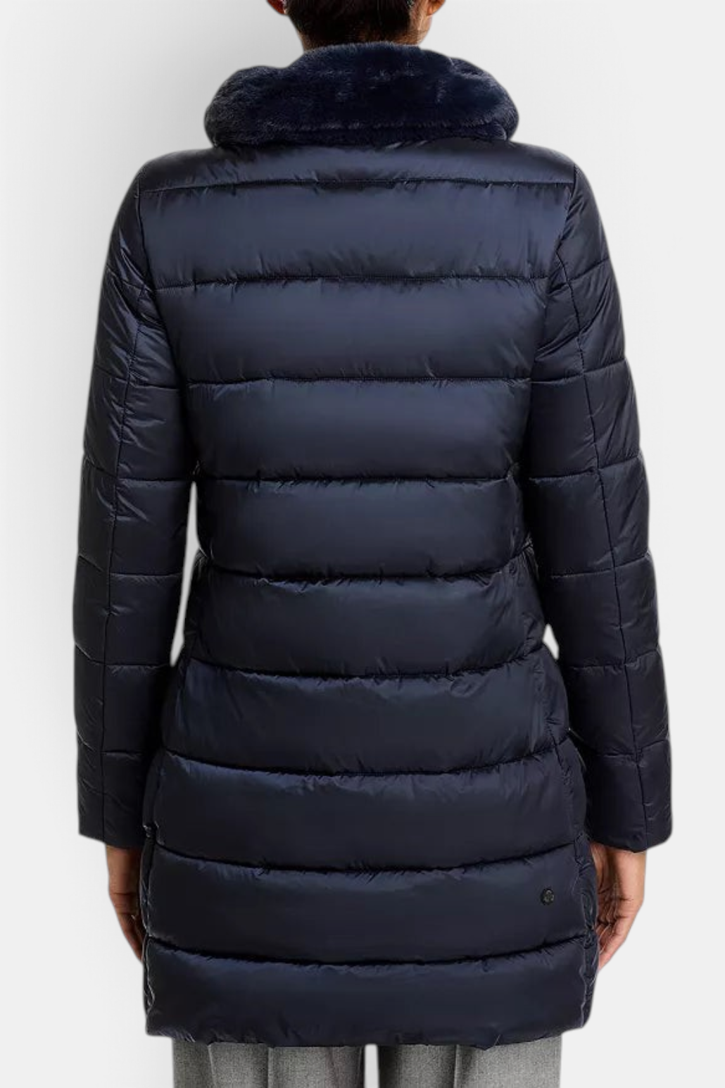 The Copper Shed Dalea navy blue quilted puffer coat with a faux-fur stand collar, seen from the back.