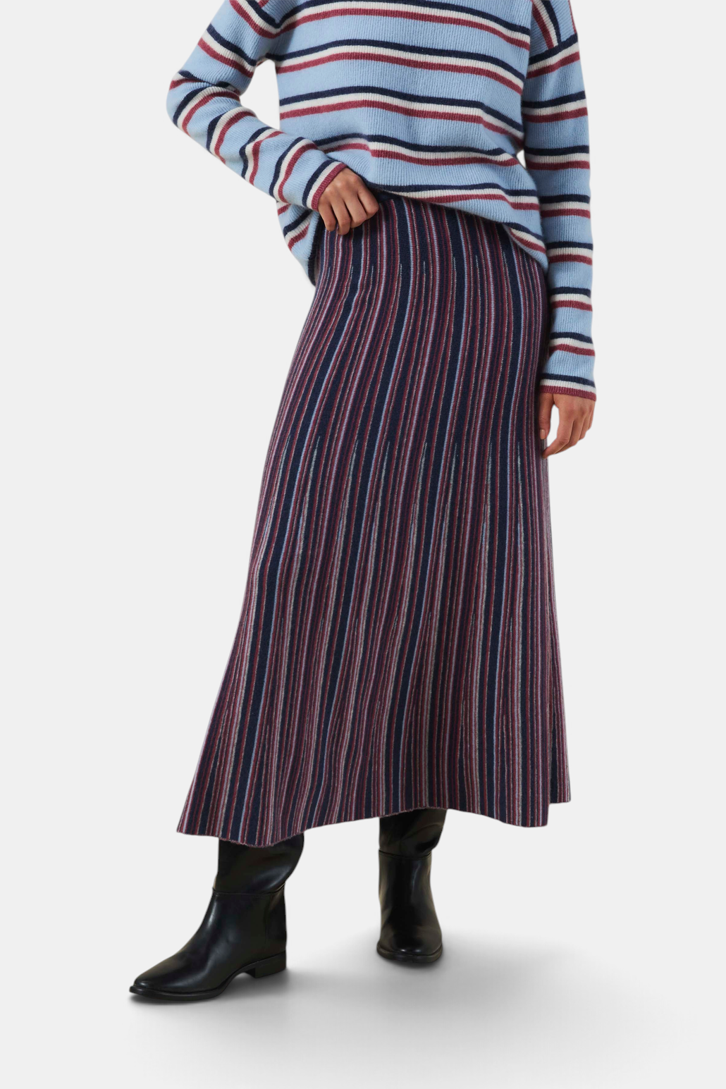 The Copper Shed Desiree08 midi skirt in a multi-colored vertical striped knit fabric.