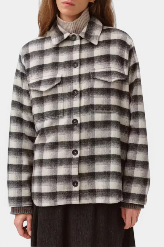 The Copper Shed Diega Sahra overshirt in a black and white plaid wool blend with a loose, androgynous fit.