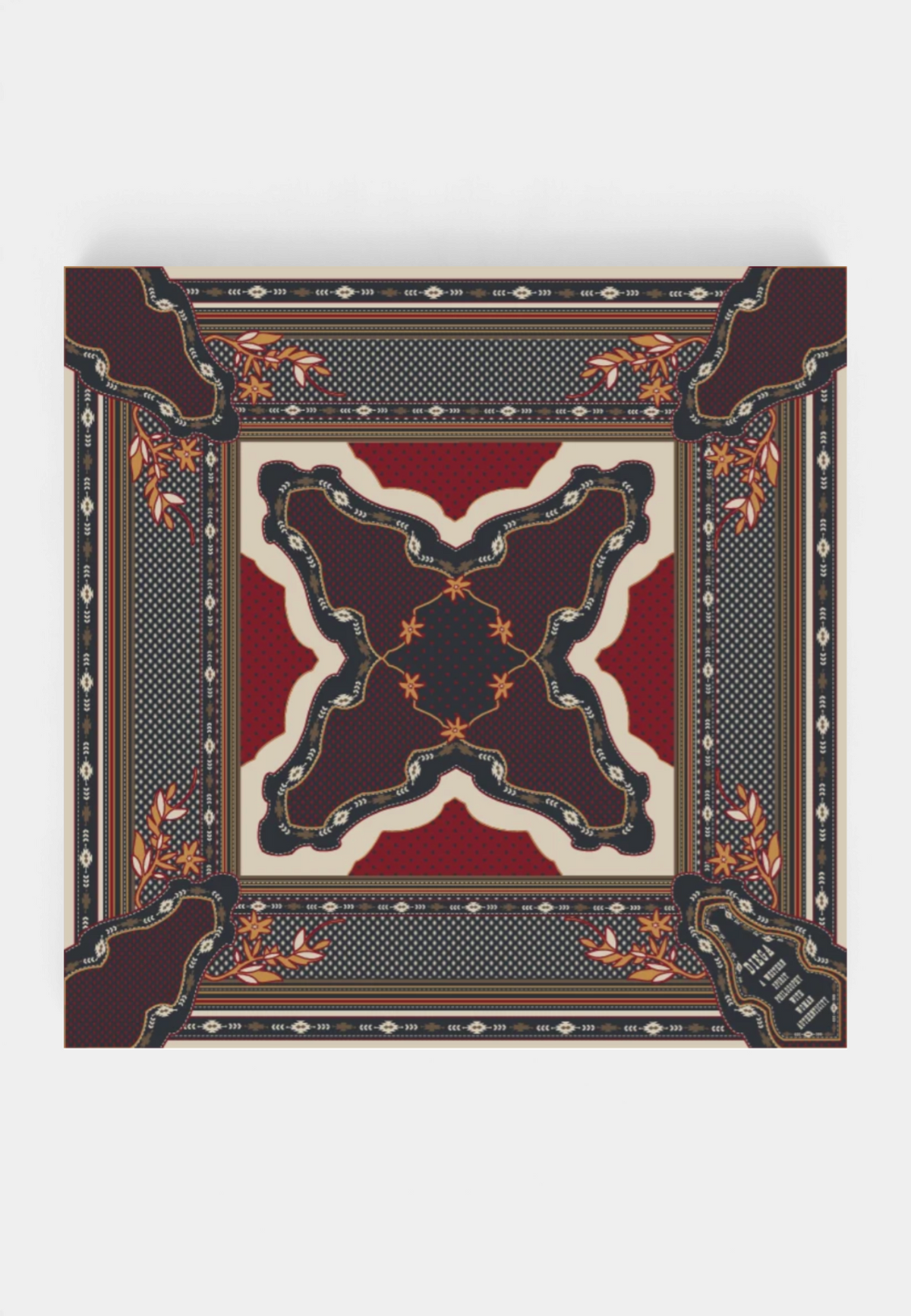 The Copper Shed Fareo silk scarf featuring a vibrant chocolate and red geometric print with artisanal floral accents.