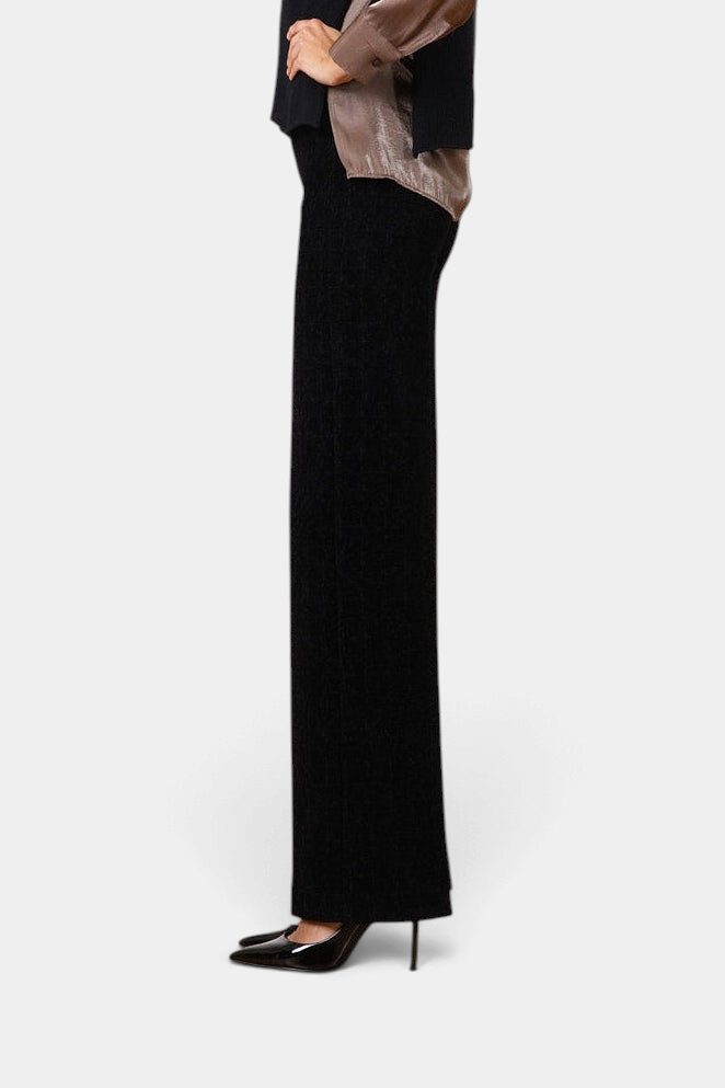 The Copper Shed Flavia velvet touch pull-on palazzo pants in black, featuring a slim, pocket-free flowing silhouette.