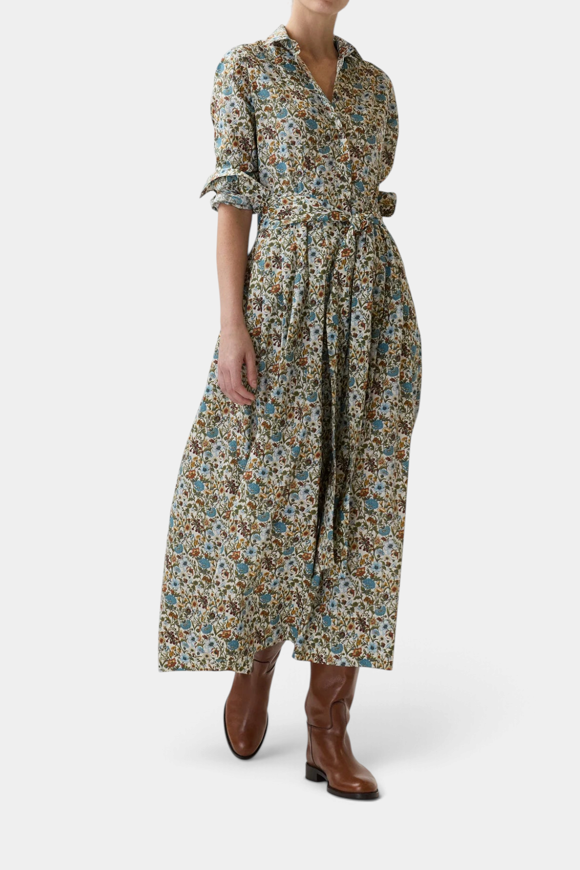 The Copper Shed floral print cotton shirtwaist maxi dress with a belted waist, pleated skirt, and mother-of-pearl buttons