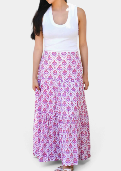 The Copper Shed ankle length tiered cotton skirt featuring a pink and purple floral block print pattern.