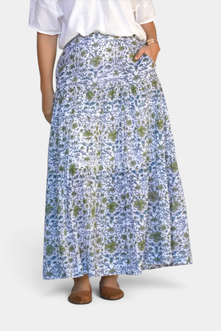 The Copper Shed ankle-length tiered cotton skirt featuring a green and blue floral block print pattern.