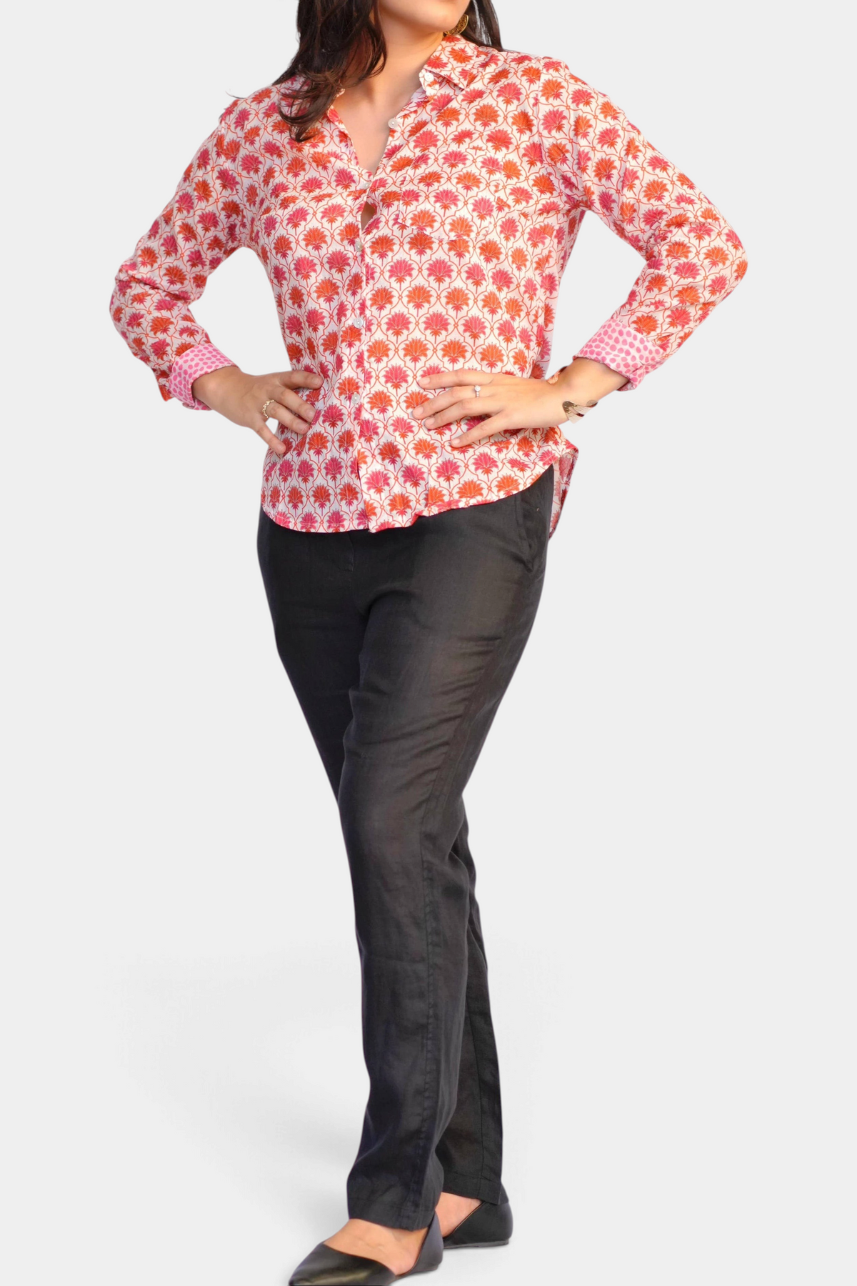 The Copper Shed Frannie shirt in a red and pink floral block print with long sleeves and a crisp collar.