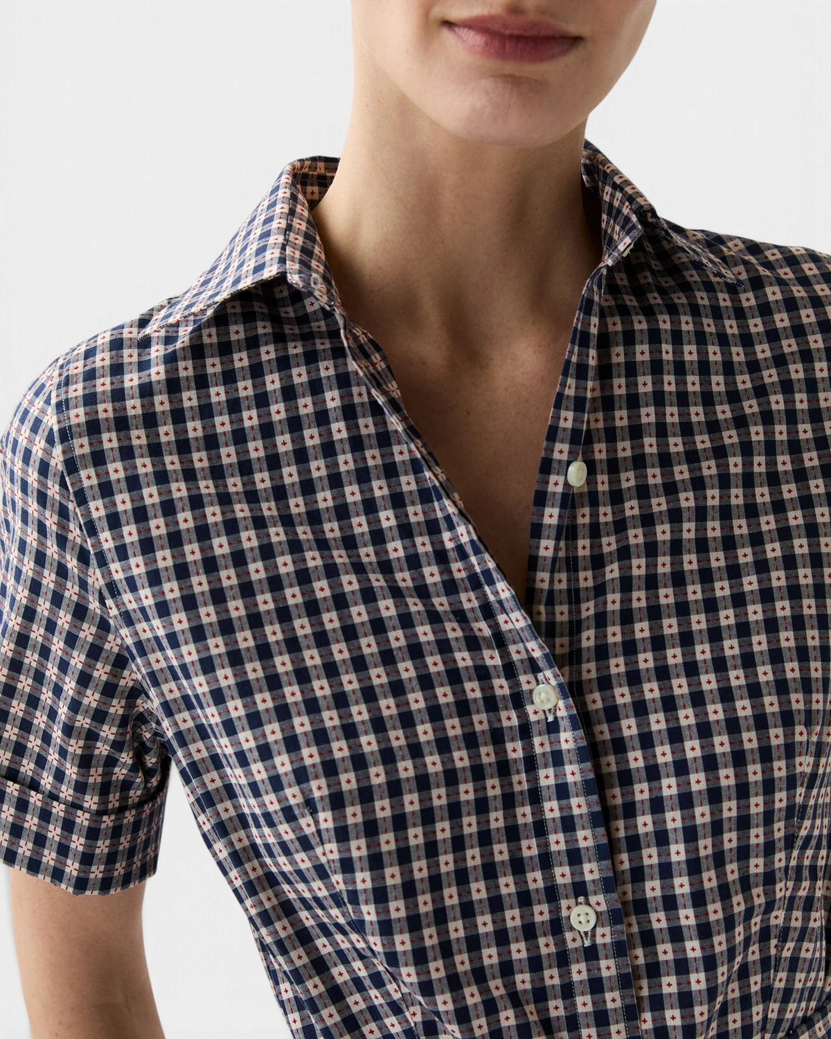 The Copper Shed short-sleeved shirtwaist dress in navy and white embroidered Japanese gingham cotton with shell buttons