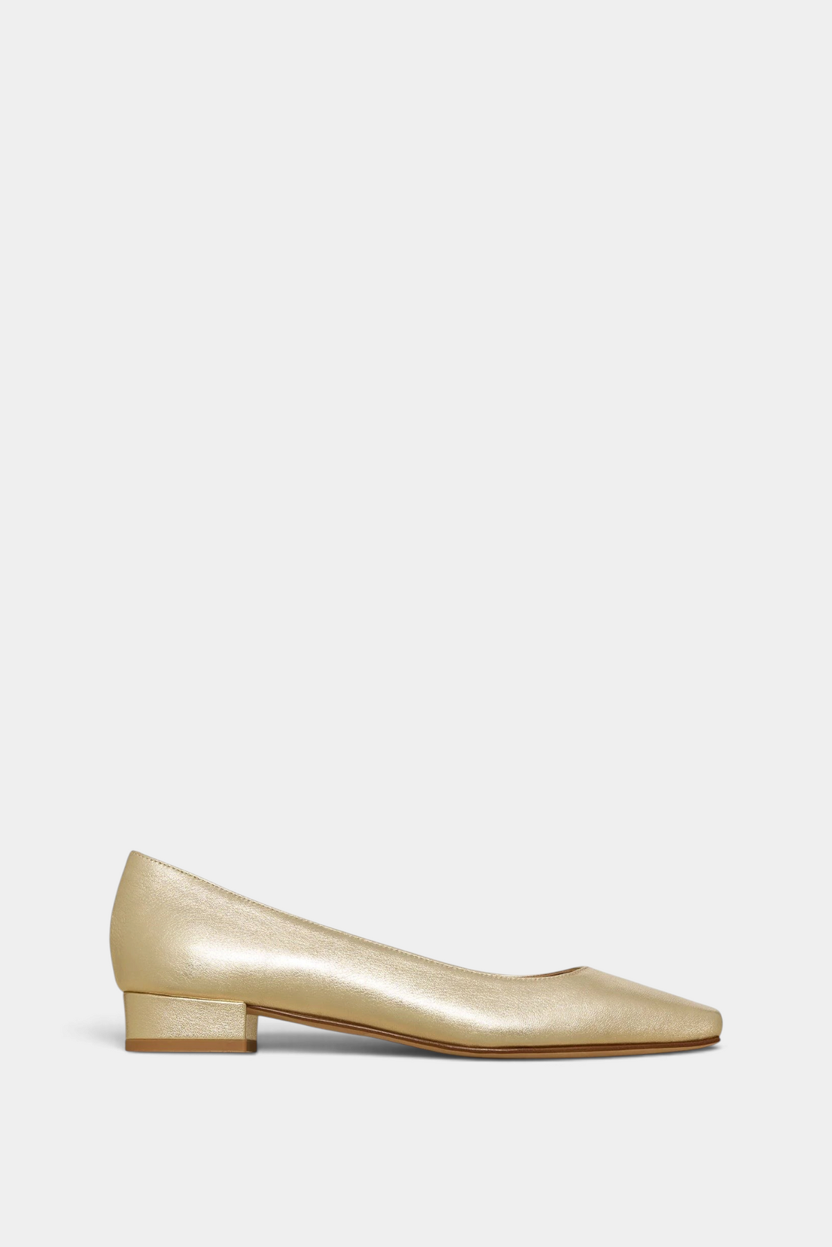 The Copper Shed Cecelia flat in metallic gold Italian lambskin with a low covered heel and cushioned insole.