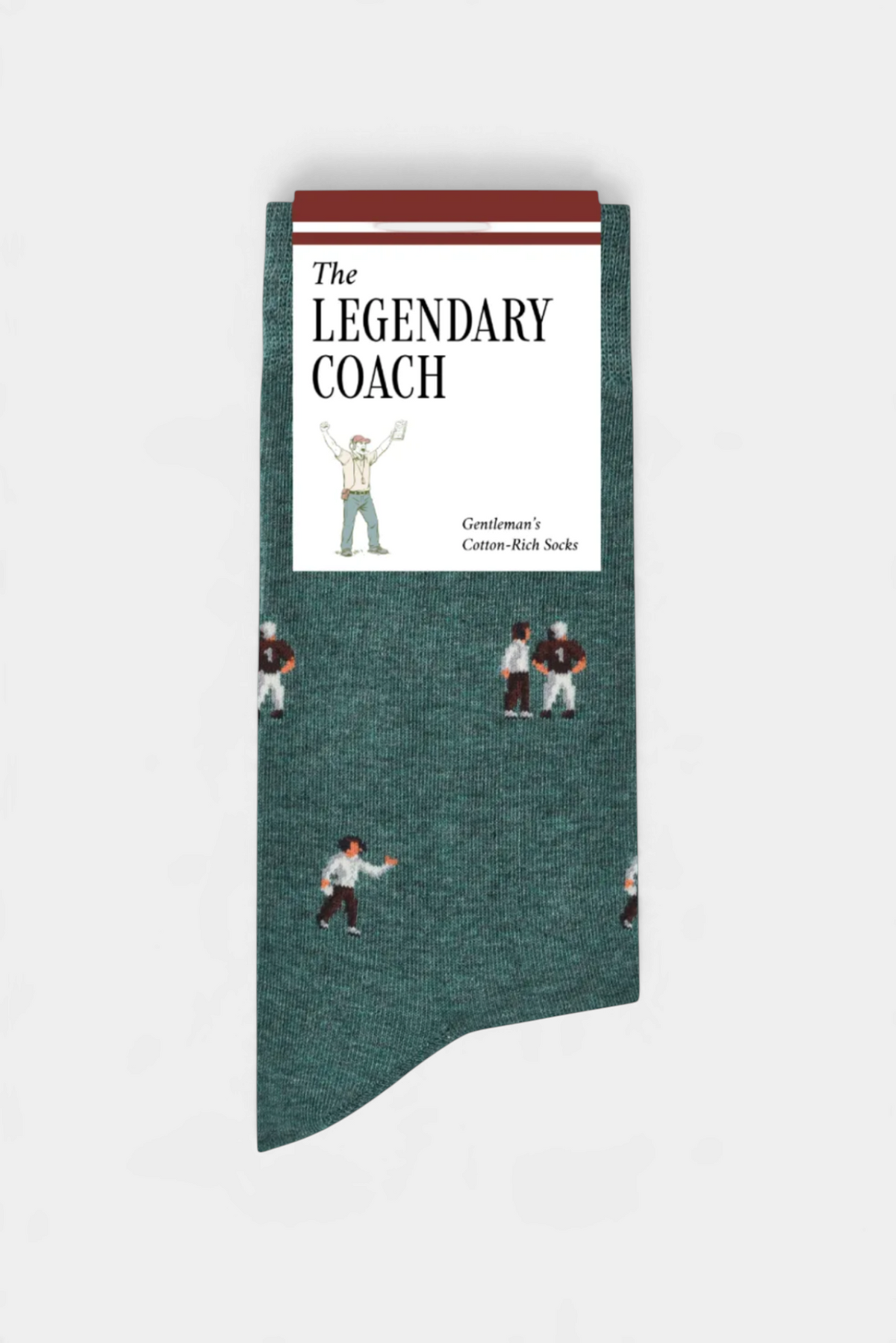 The Copper Shed green cotton-rich novelty socks featuring a detailed coach pattern with whistle and clipboard