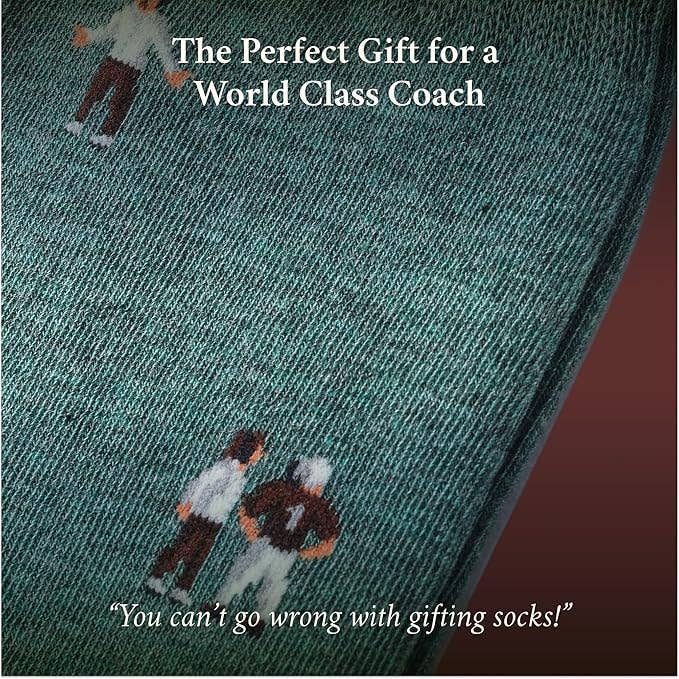 The Copper Shed novelty socks in dark green cotton featuring a knitted coach pattern with whistle and clipboard