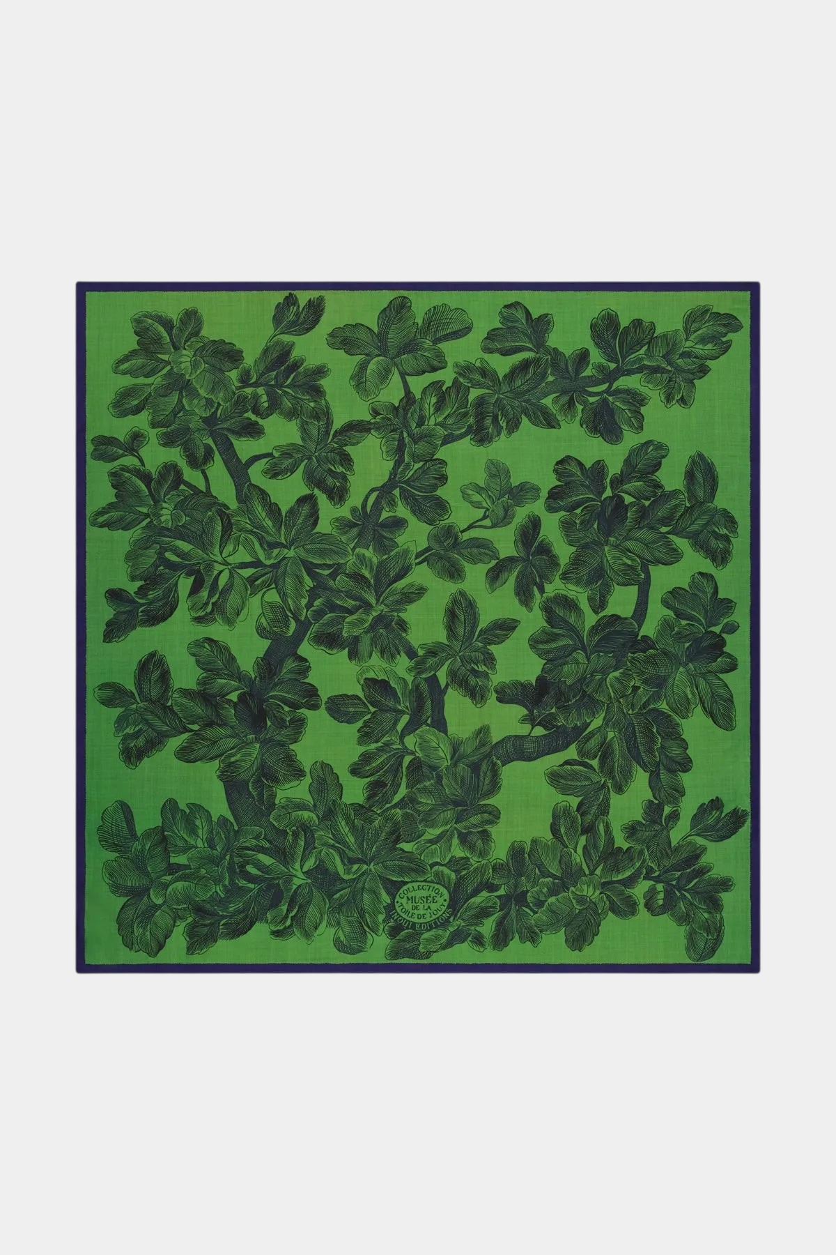 The Copper Shed square wool scarf in green featuring a detailed dark green branch and leaf pattern.