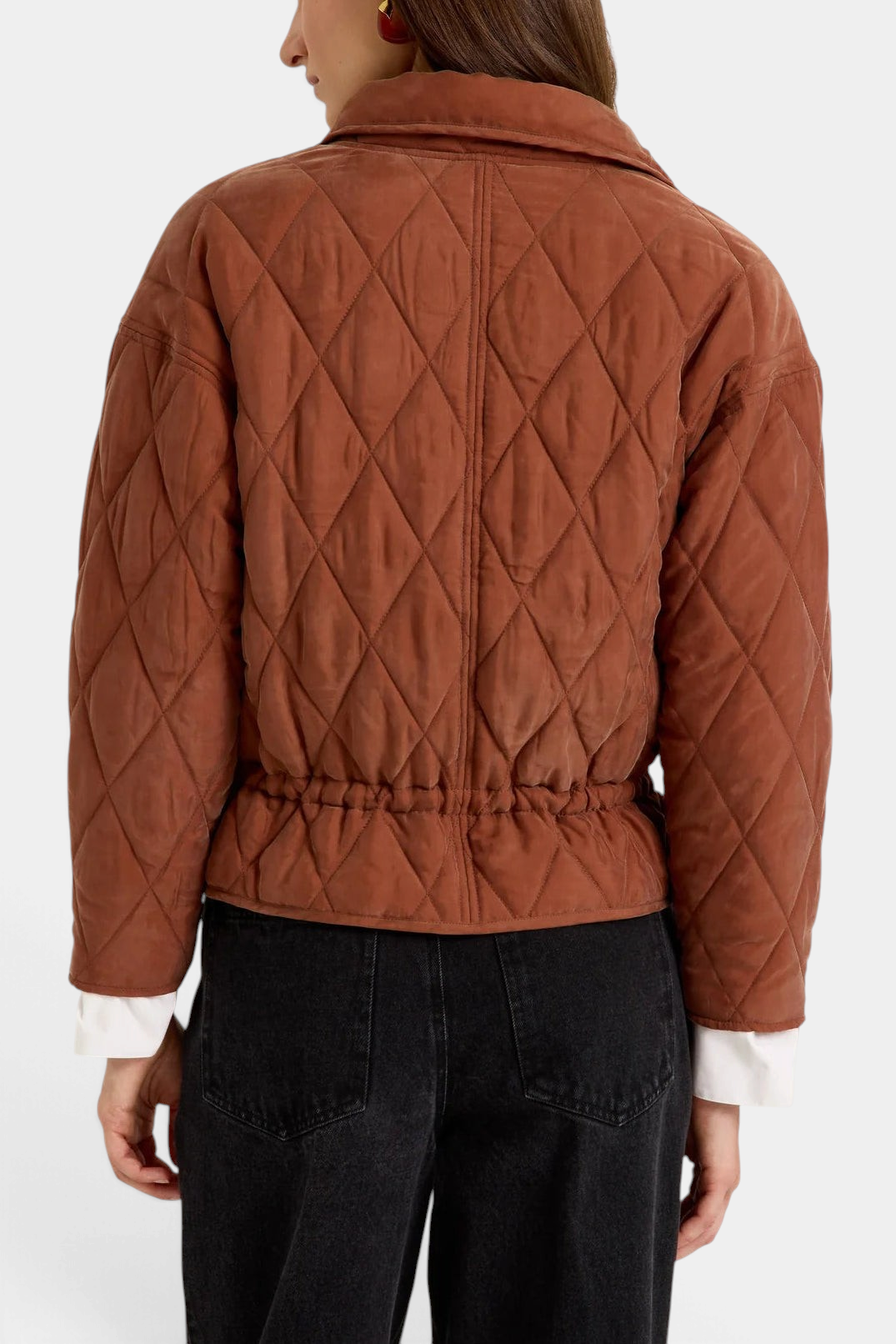 Back view of The Copper Shed Haisley quilted jacket in tortoise brown with a cinchable drawstring waist.