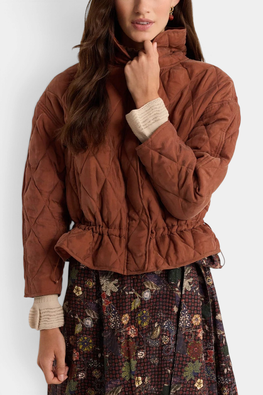 The Copper Shed Haisley quilted jacket in tortoise brown with a funnel neck and adjustable drawstring waist.