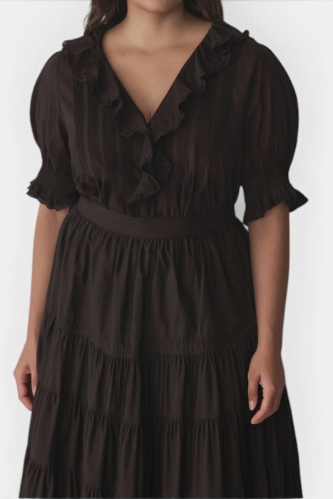 The Copper Shed Henri Top in black organic cotton voile with a V-neckline, lace-trimmed ruffles, and puffed sleeves.