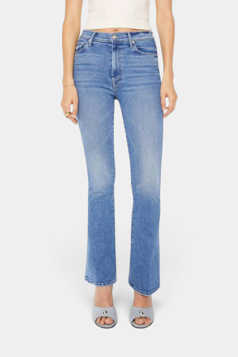 The Copper Shed High Waisted Weekender Skimp flare jeans in mid-blue denim with whiskering and a clean hem.