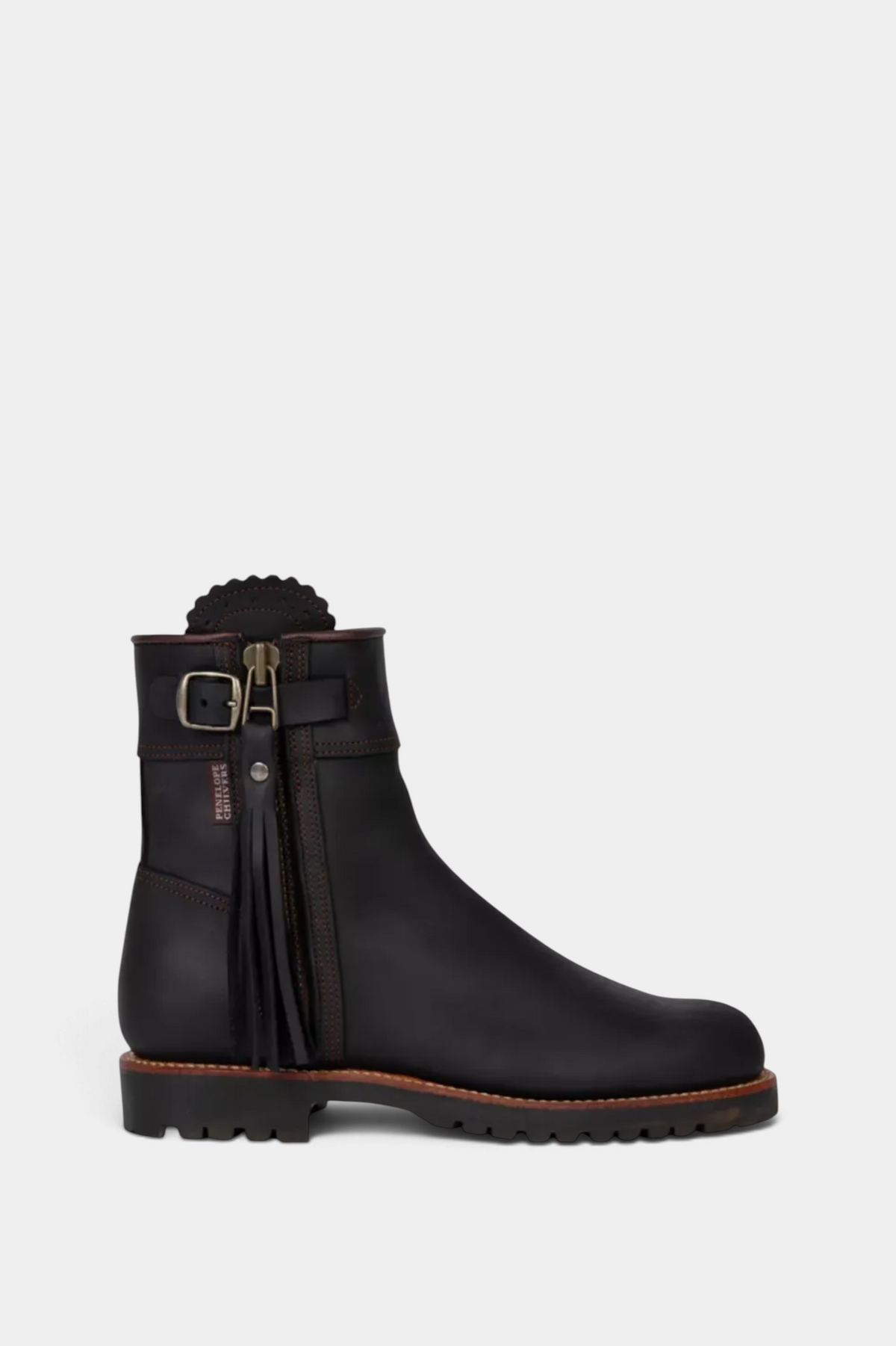 The Copper Shed Inclement cropped waterproof suede boots in dark brown with tassel detail and side buckle strap