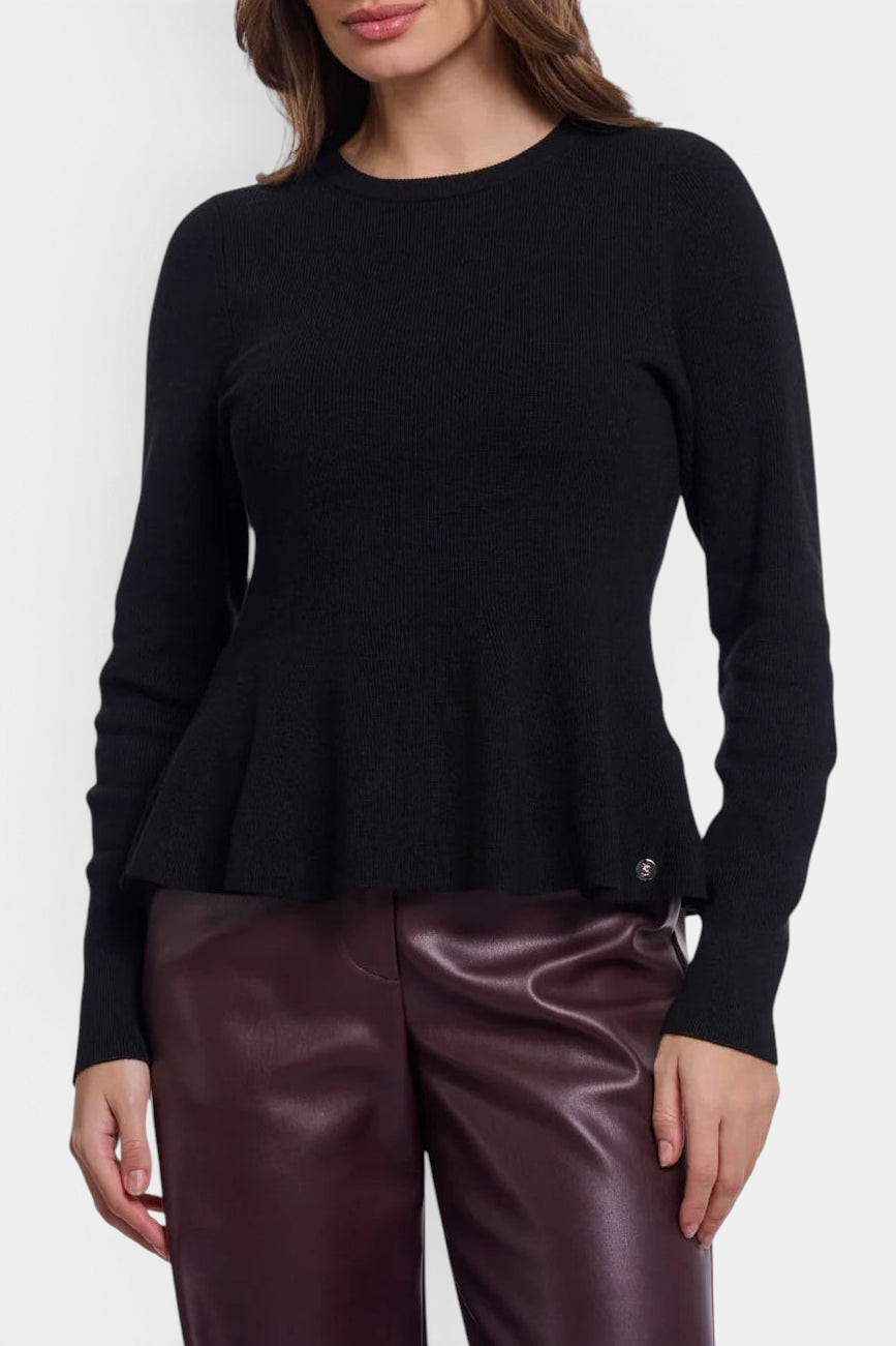 The Copper Shed Jelilah black viscose-blend knit sweater with a round neck, long sleeves, and a flared peplum waist.