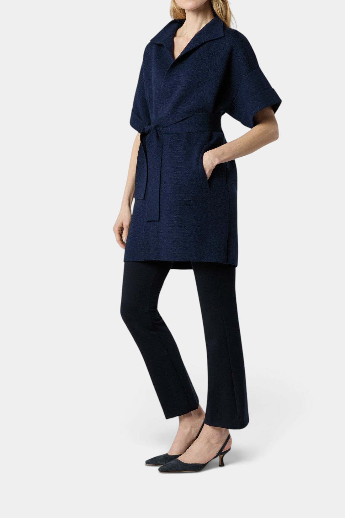 The Copper Shed Julia merino wool cardigan in navy with short sleeves, stand collar, and a removable waist belt.