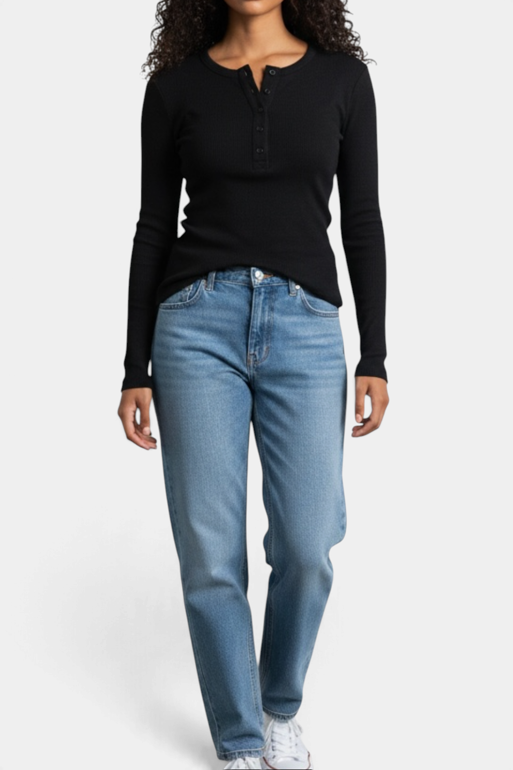 The Copper Shed Kaia black ribbed cotton henley long sleeve tee with a five-button placket worn with blue jeans