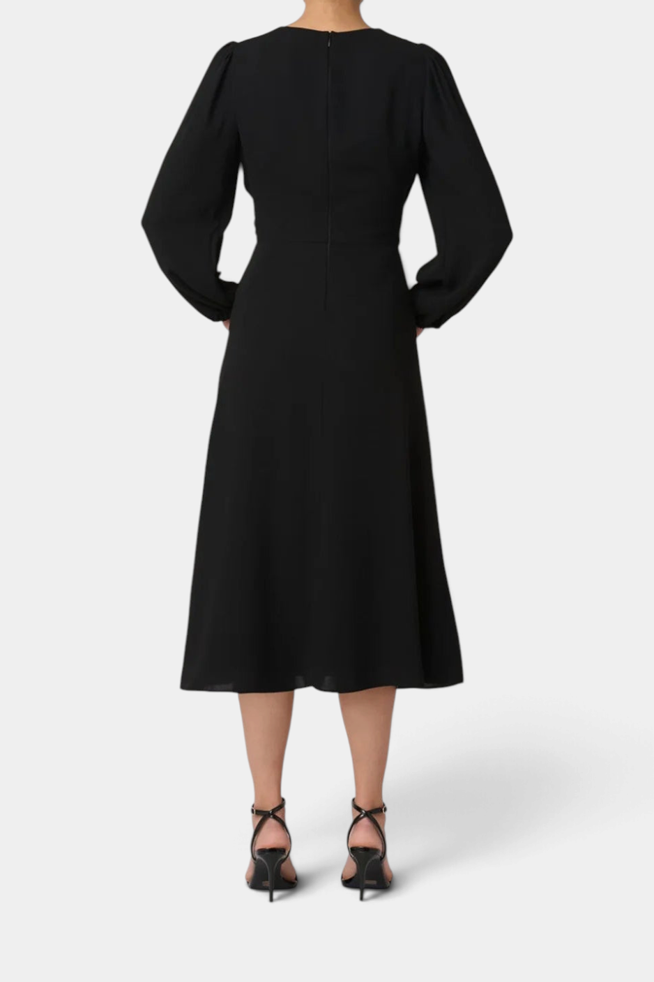 The Copper Shed Kathleen midi dress in black crepe with long sleeves and a back zipper, shown from the rear view.
