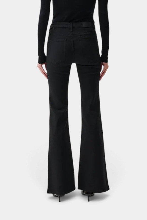 The Copper Shed Kinsley mid-rise ultra flare jeans in black stretch denim, back view showing wide leg silhouette.