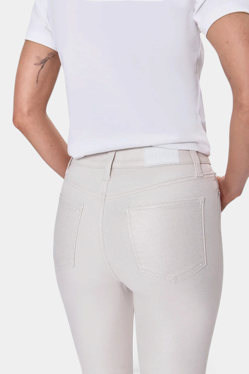 The Copper Shed Lennon high rise crop boot jeans in a light beige comfort-stretch denim with a back view.