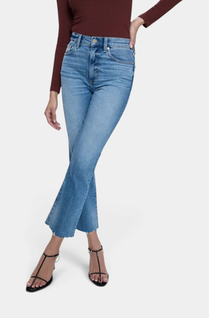 The Copper Shed Lennon high rise boot cut jeans in medium wash comfort-stretch denim with a cropped raw hem