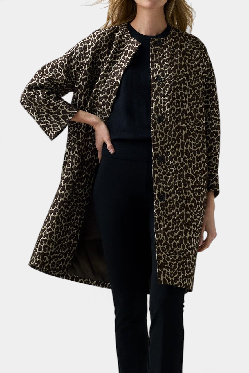 The Copper Shed Reed evening coat in shimmery metallic leopard print Italian jacquard with a simple jewel-neck collar.