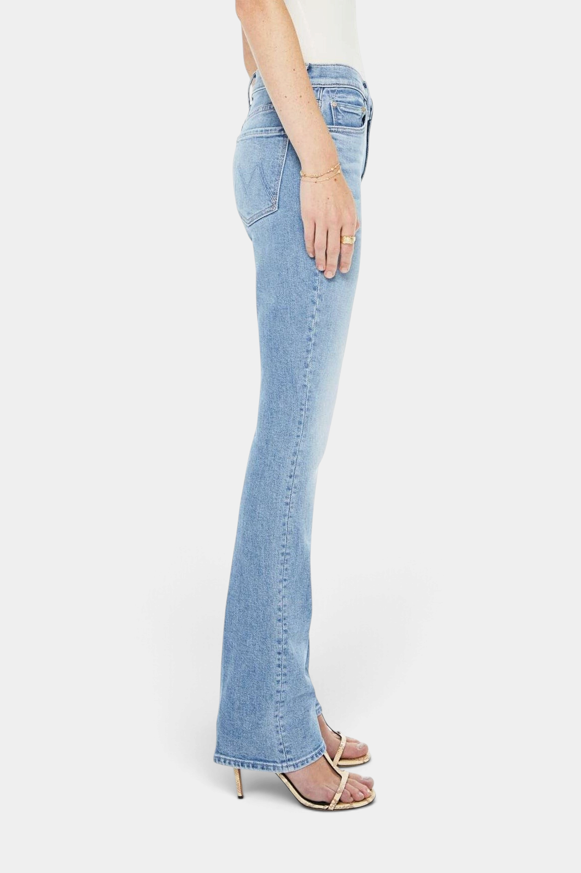 The Copper Shed The Insider Skimp high-waisted light blue bootcut jeans with whiskering and a clean hem, side view.