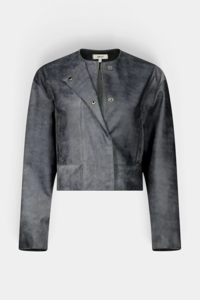 The Copper Shed Mia cropped leather jacket in vintage indigo with a round neckline, zip and snap button closure.