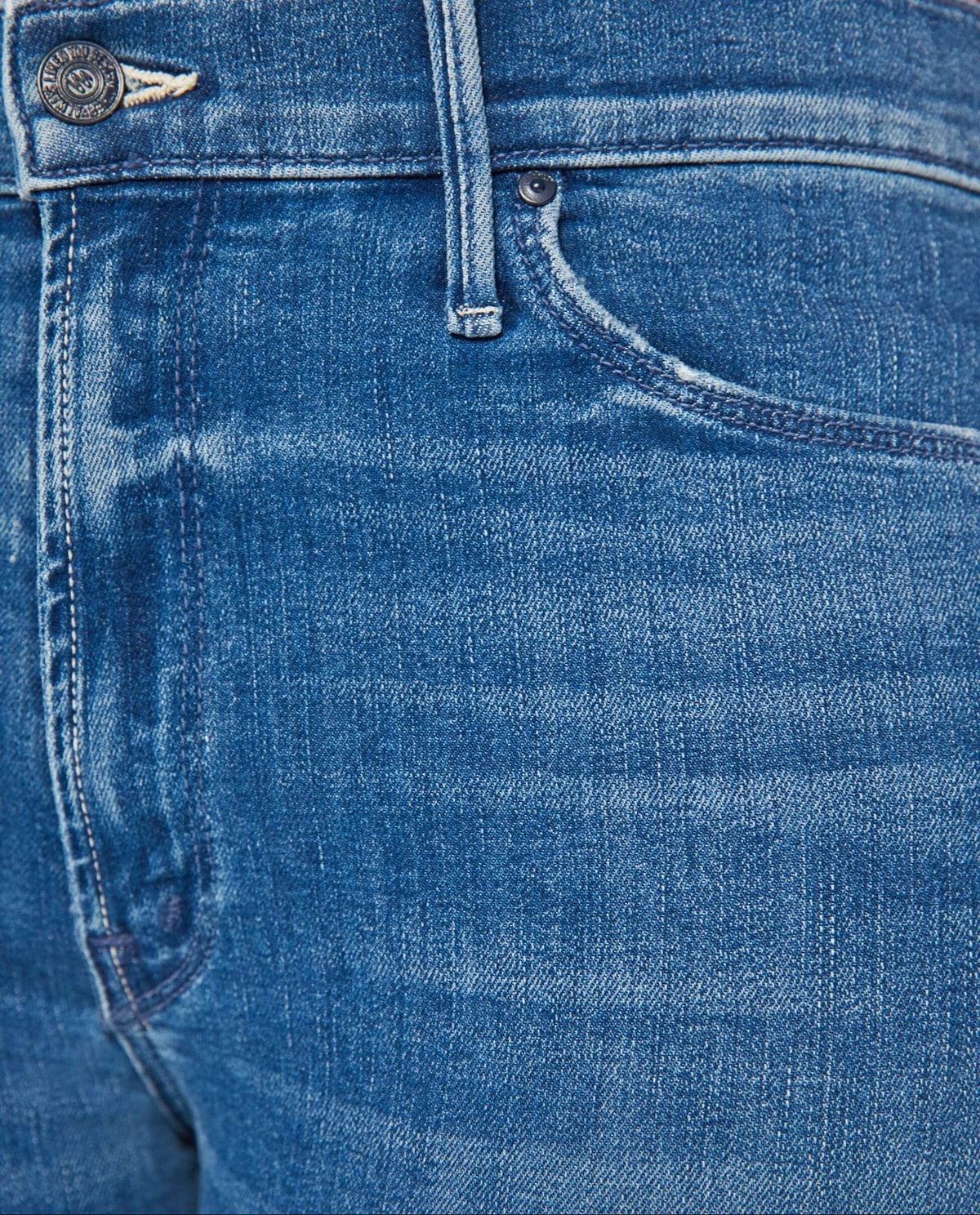 The Copper Shed Mid Rise Dazzler Ankle jeans in blue denim with a zip fly and classic five-pocket styling