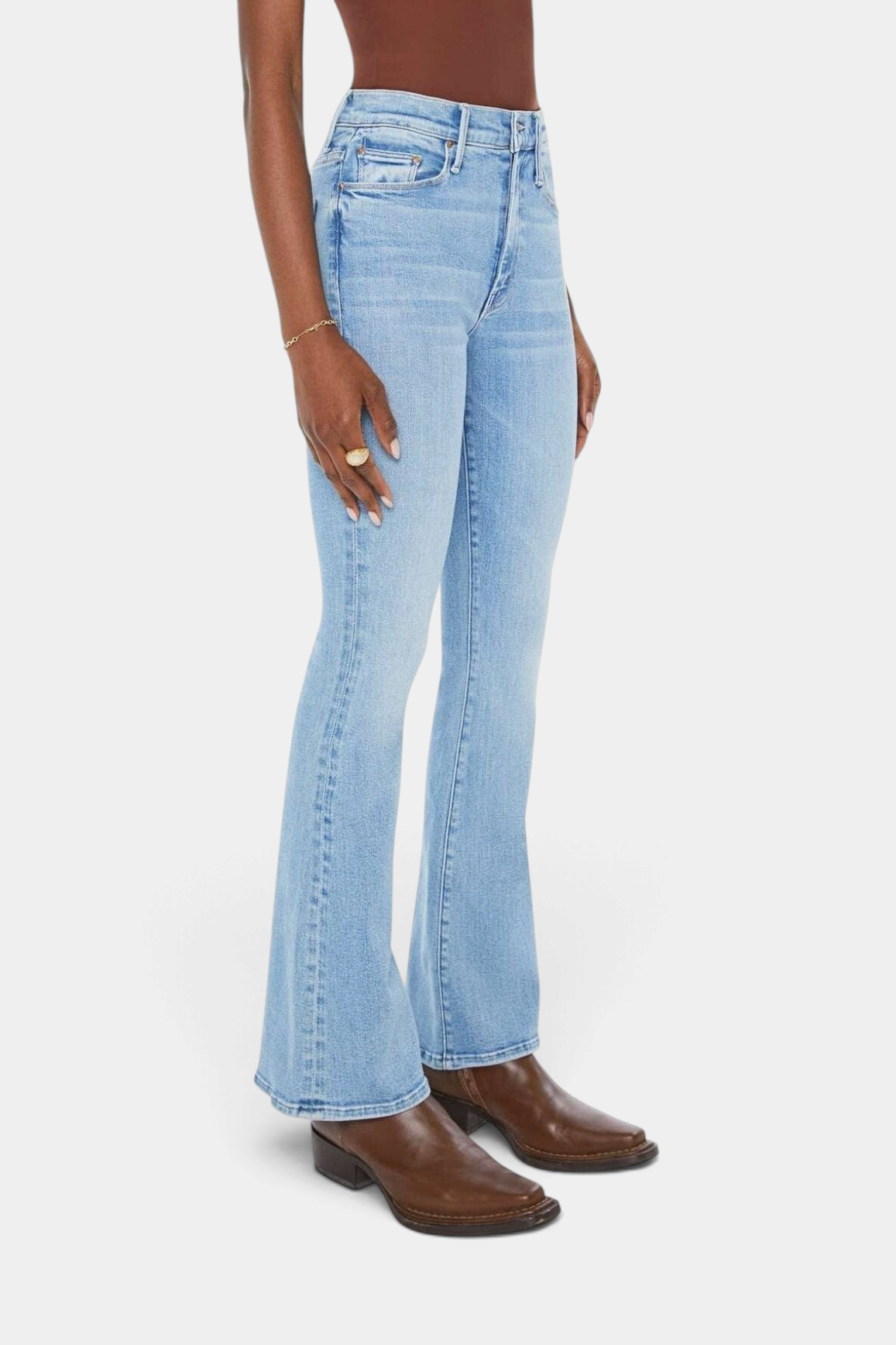The Copper Shed The Weekender mid-rise flare jeans in a faded mid-blue stretch denim with a clean hem
