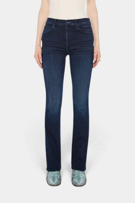 The Copper Shed mid-rise flared jeans in dark blue stretch denim with subtle whiskering and a clean hem