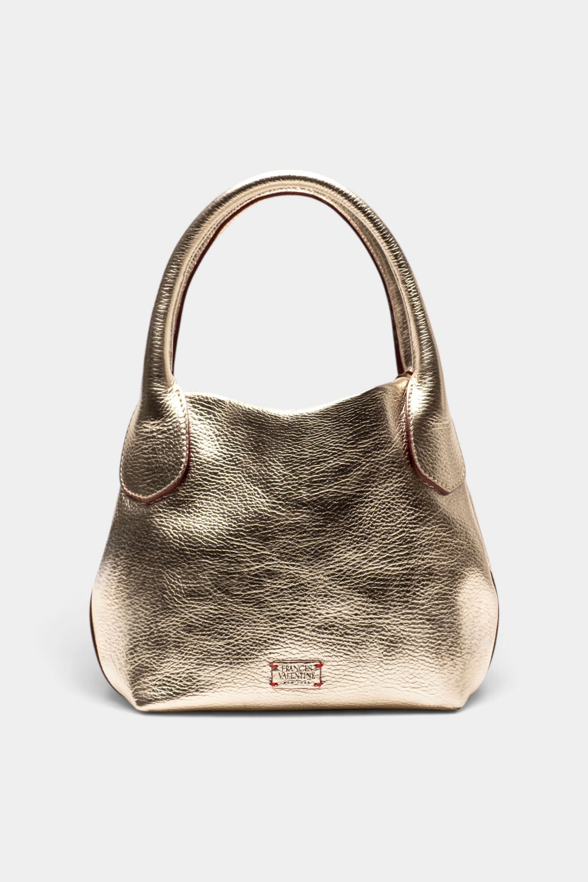 The Copper Shed Mini Sweet Pea metallic gold Italian tumbled leather tote bag with a structured silhouette.