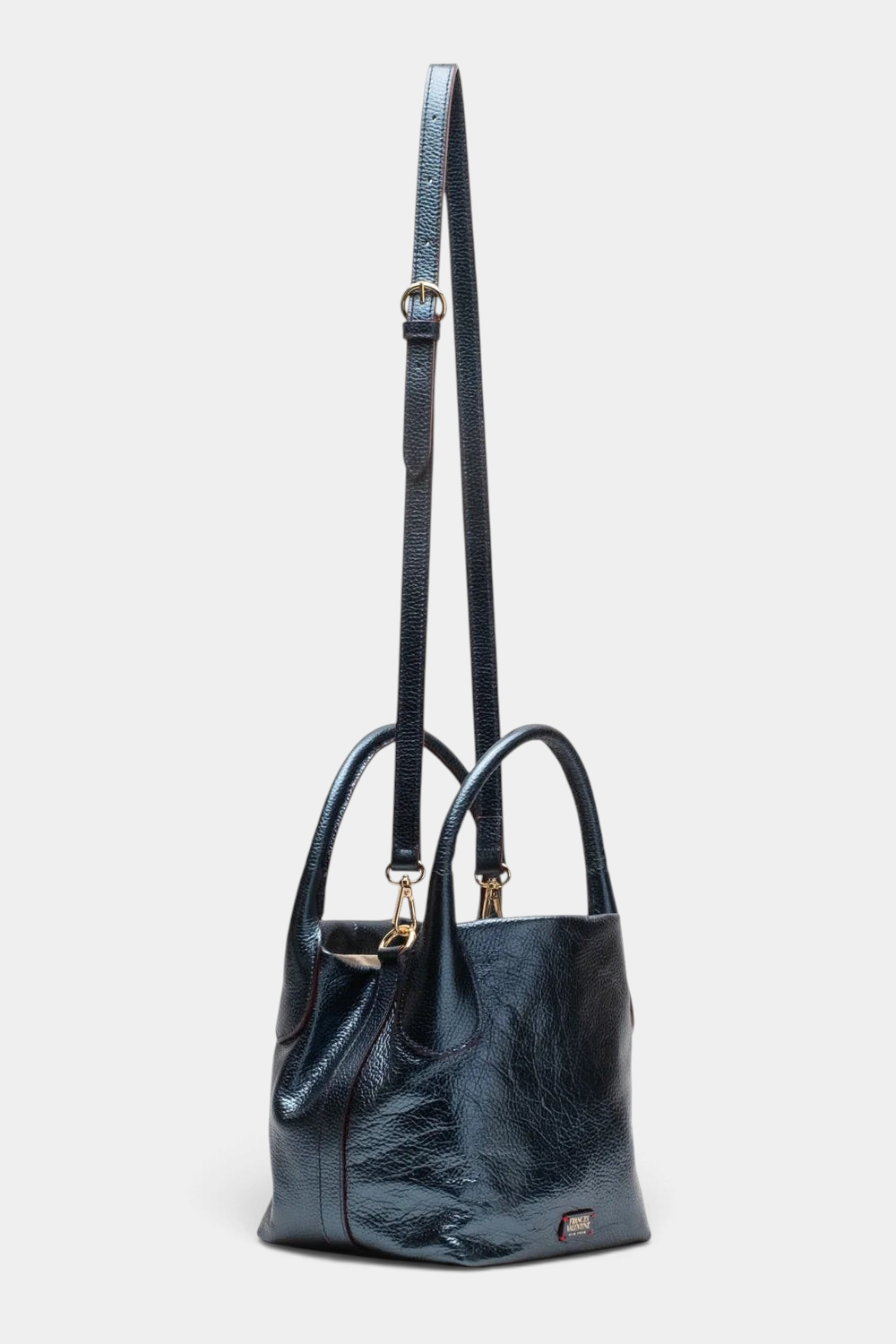The Copper Shed Mini Sweet Pea Italian tumbled leather tote in metallic blue with a removable crossbody strap.