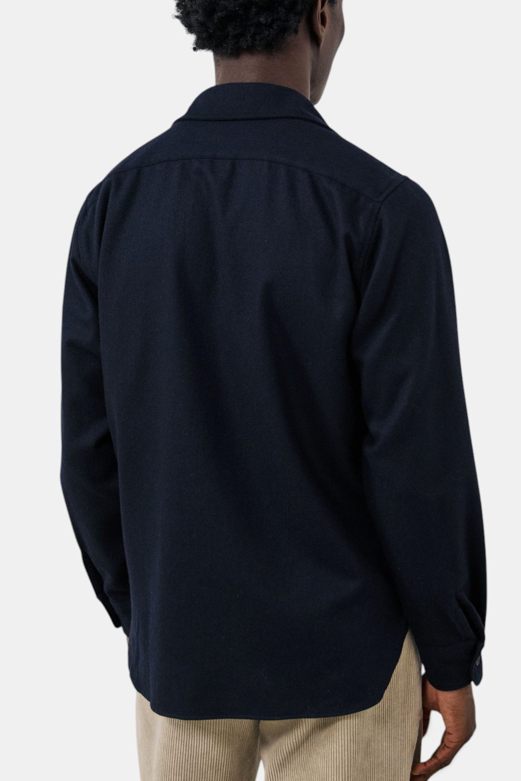 Back view of The Copper Shed navy blue boiled wool flannel shirt with a classic collar and long sleeves.