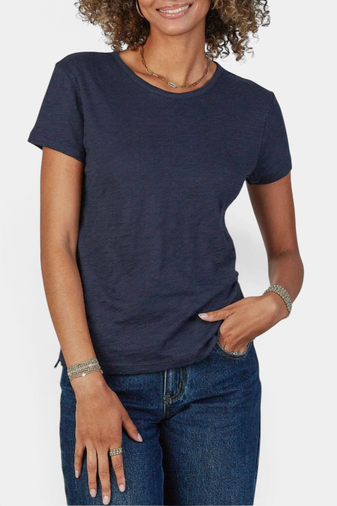 Model wearing The Copper Shed navy pima cotton slub crew neck t-shirt with short sleeves and a tagless design.