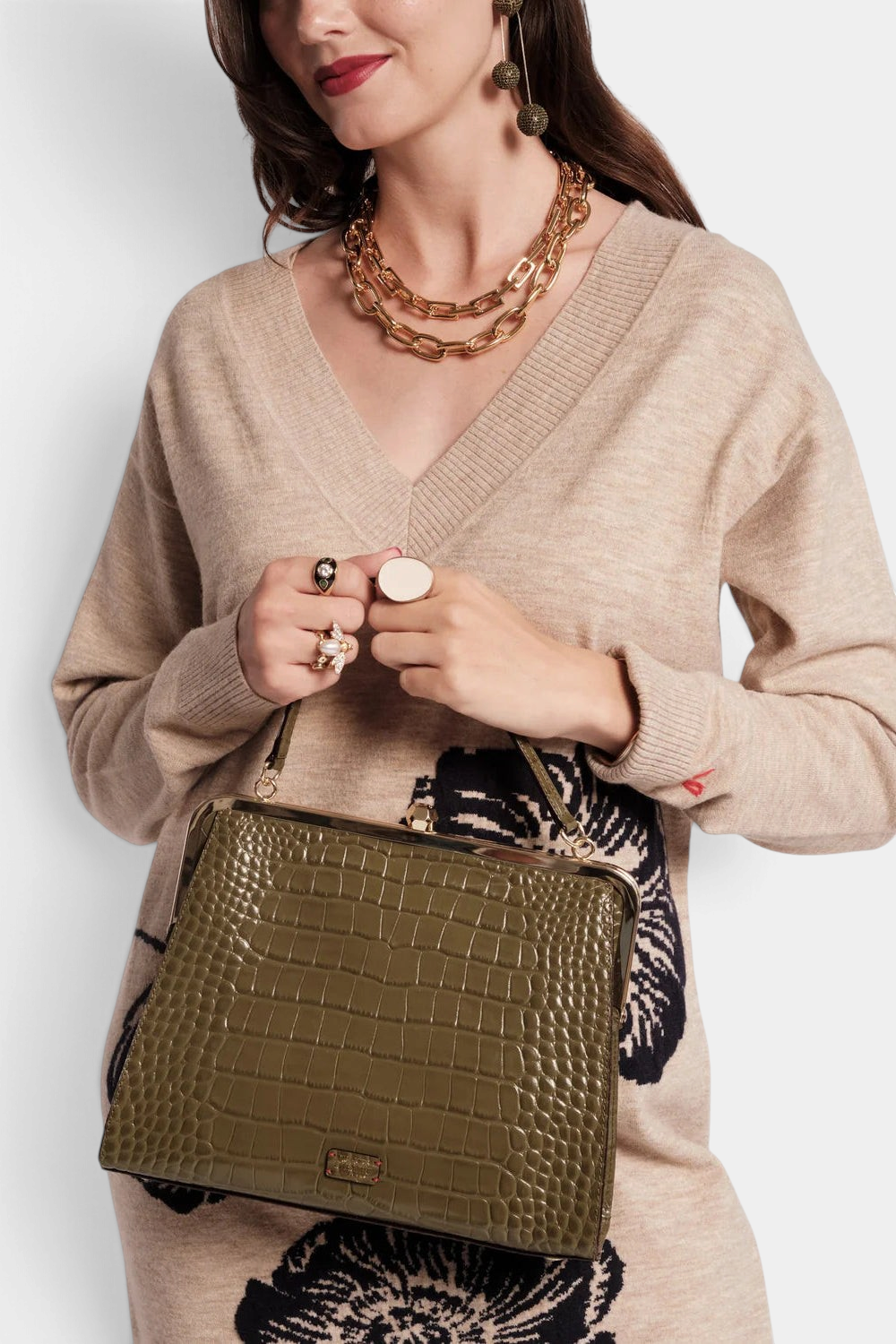 The Copper Shed Jackie Frame bag in olive green croc-embossed leather with a vintage kiss-lock closure.