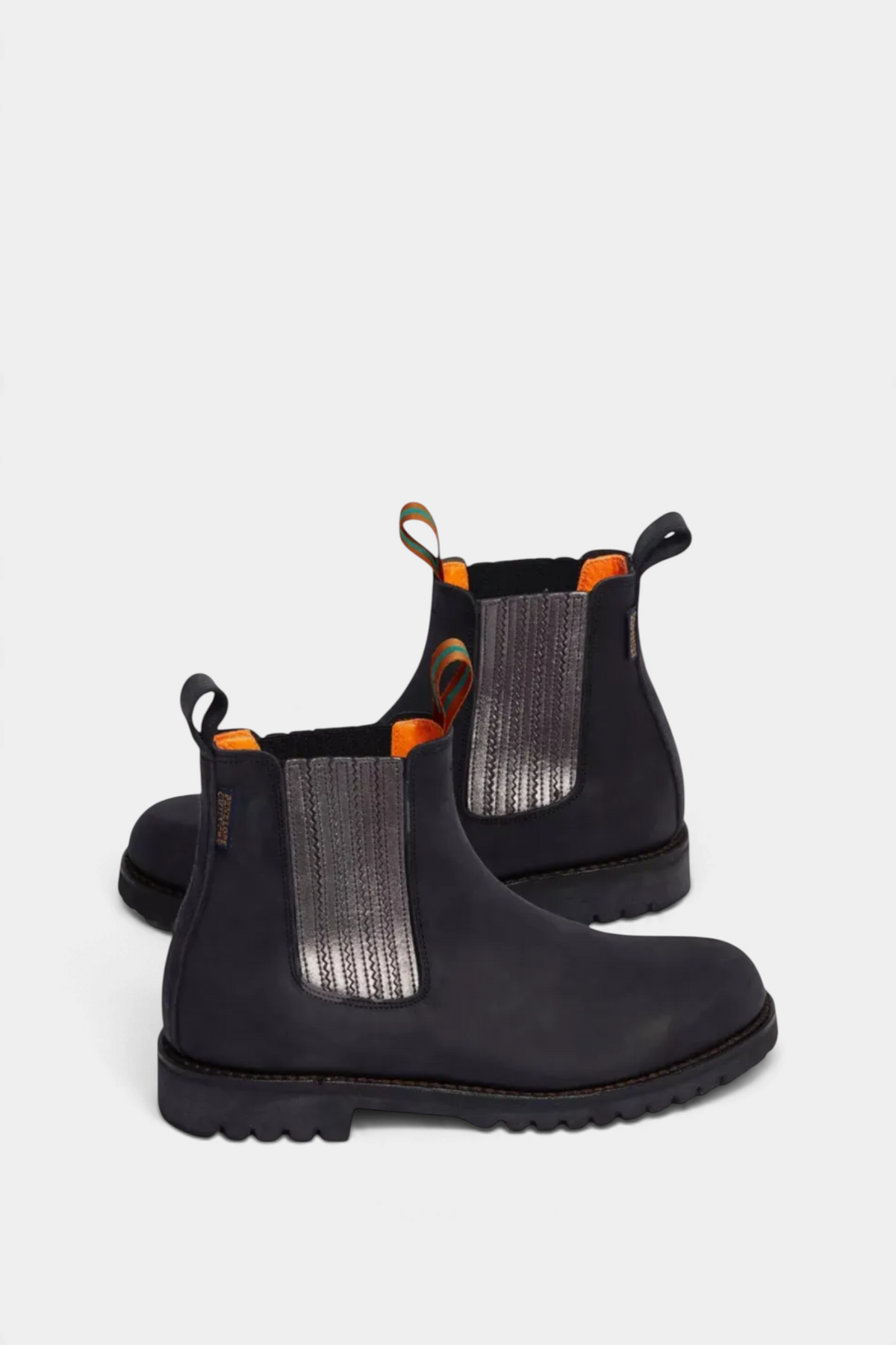 The Copper Shed Oscar Chelsea boots in bitter chocolate Spanish leather with metallic side panels and tread soles.