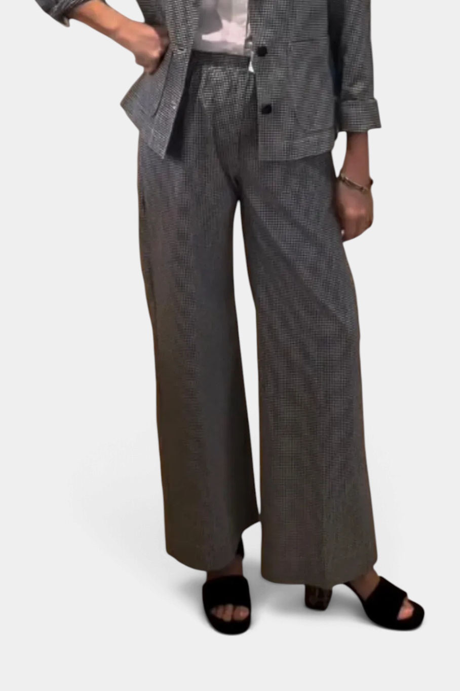 The Copper Shed Palerme wide-leg pants in a grey micro-check cotton blend with an elastic waistband and side pockets.
