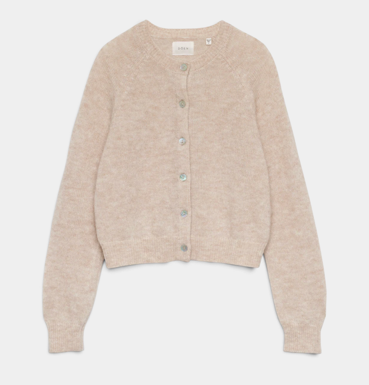 The Copper Shed Petra Cardigan in beige alpaca and merino wool blend with a crew neck and shell button front.