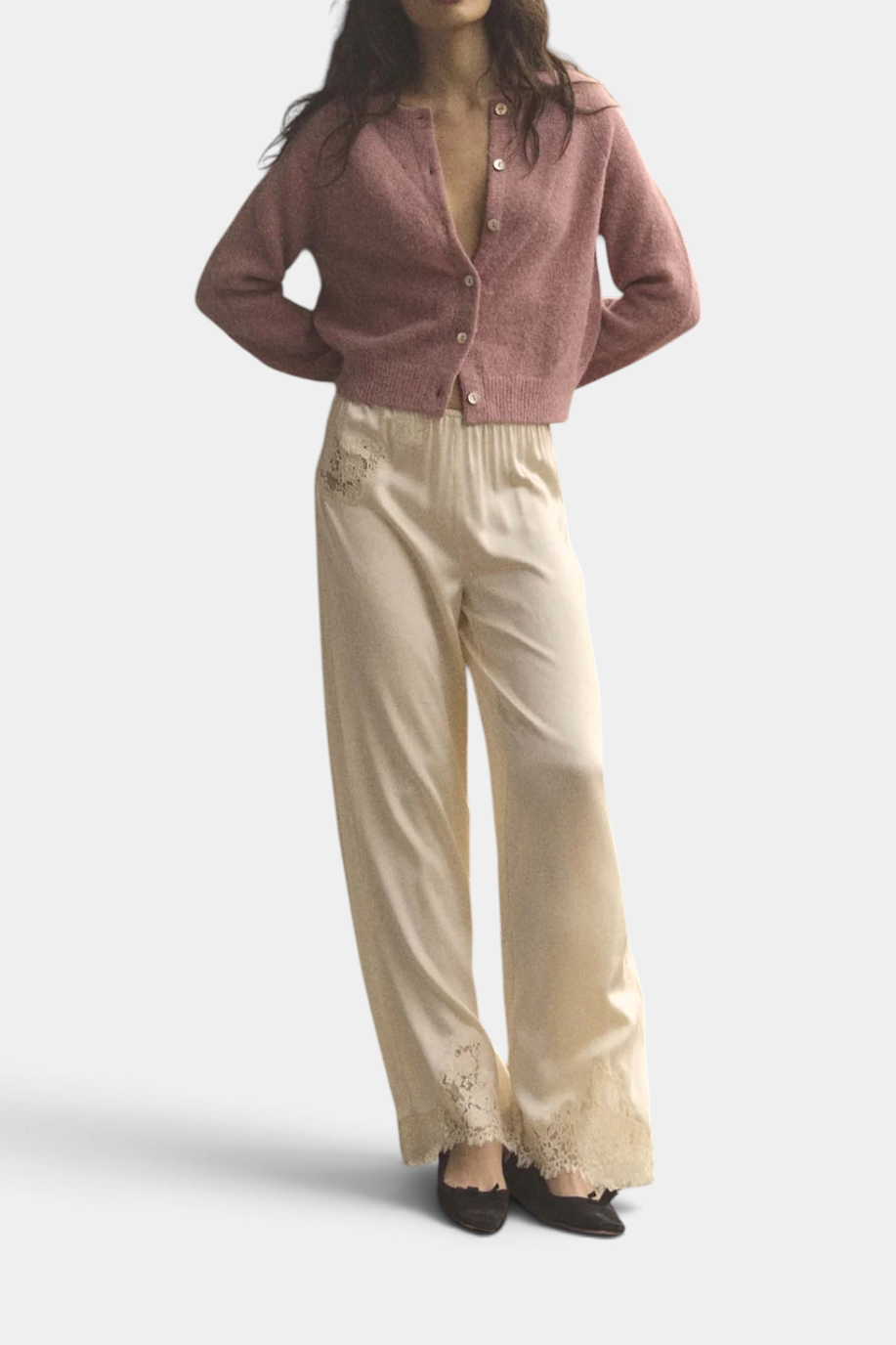 The Copper Shed Petra Cardigan in dusty pink alpaca-merino wool blend with shell buttons worn with cream silk pants