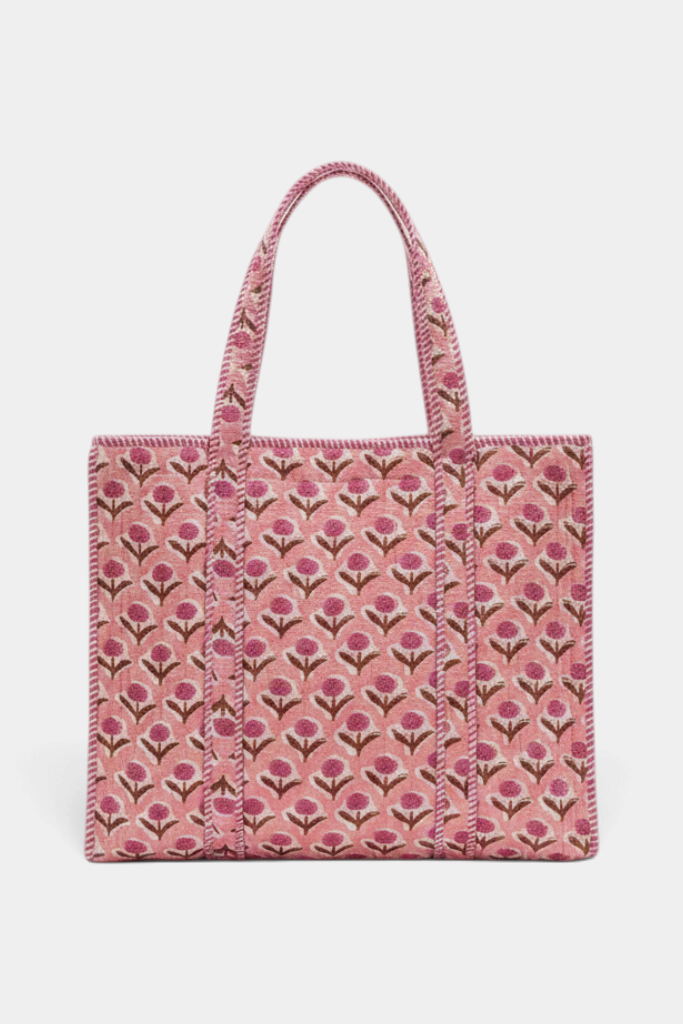 The Copper Shed pink quilted cotton tote bag featuring a handprinted floral block pattern and sturdy shoulder straps.