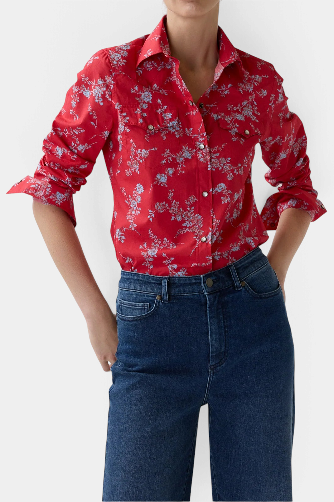 The Copper Shed Western shirt in red Liberty Fabrics floral cotton poplin with pearl snaps and twin chest pockets.