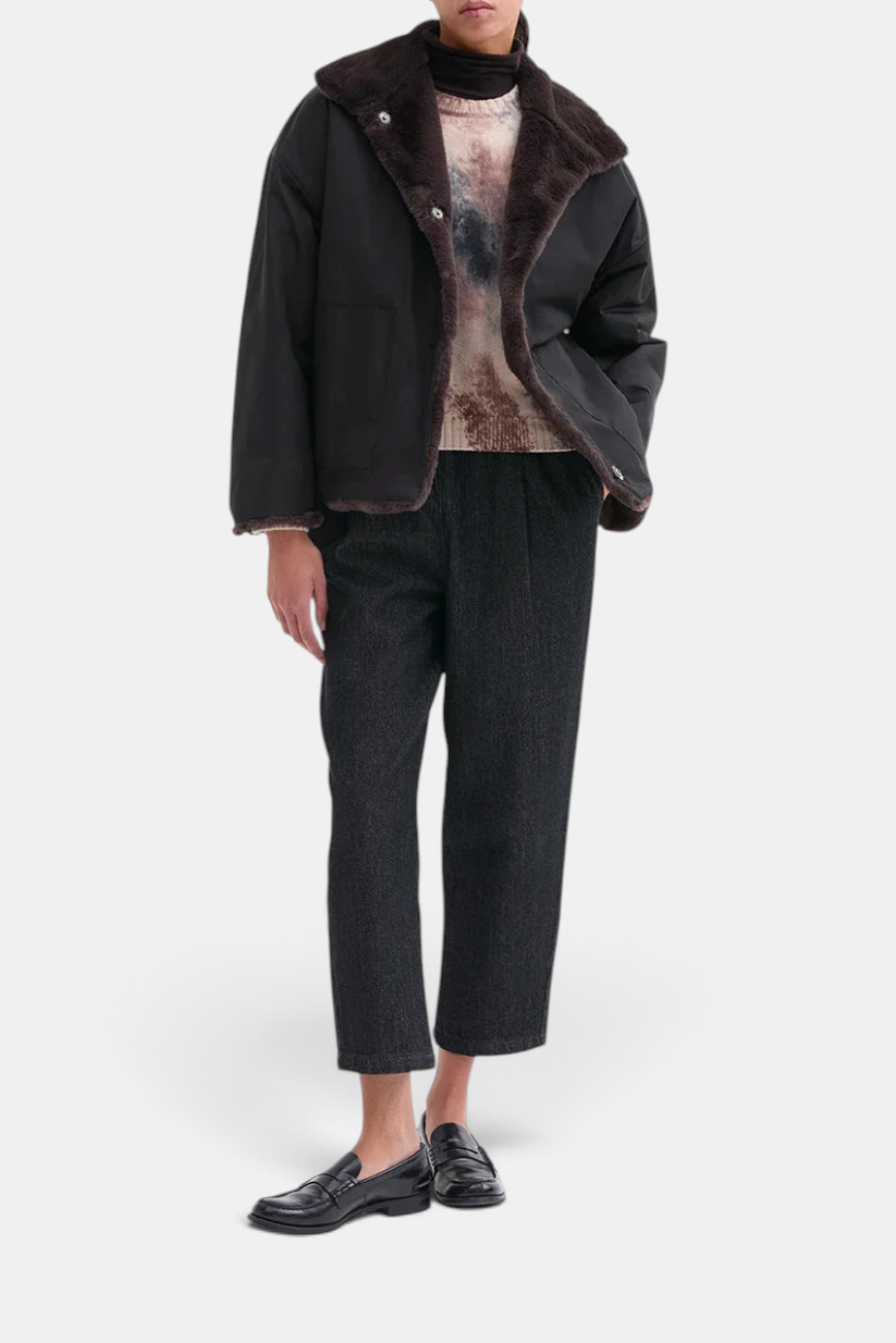 The Copper Shed reversible jacket in dark chocolate faux fur and black waterproof fabric with a relaxed fit.