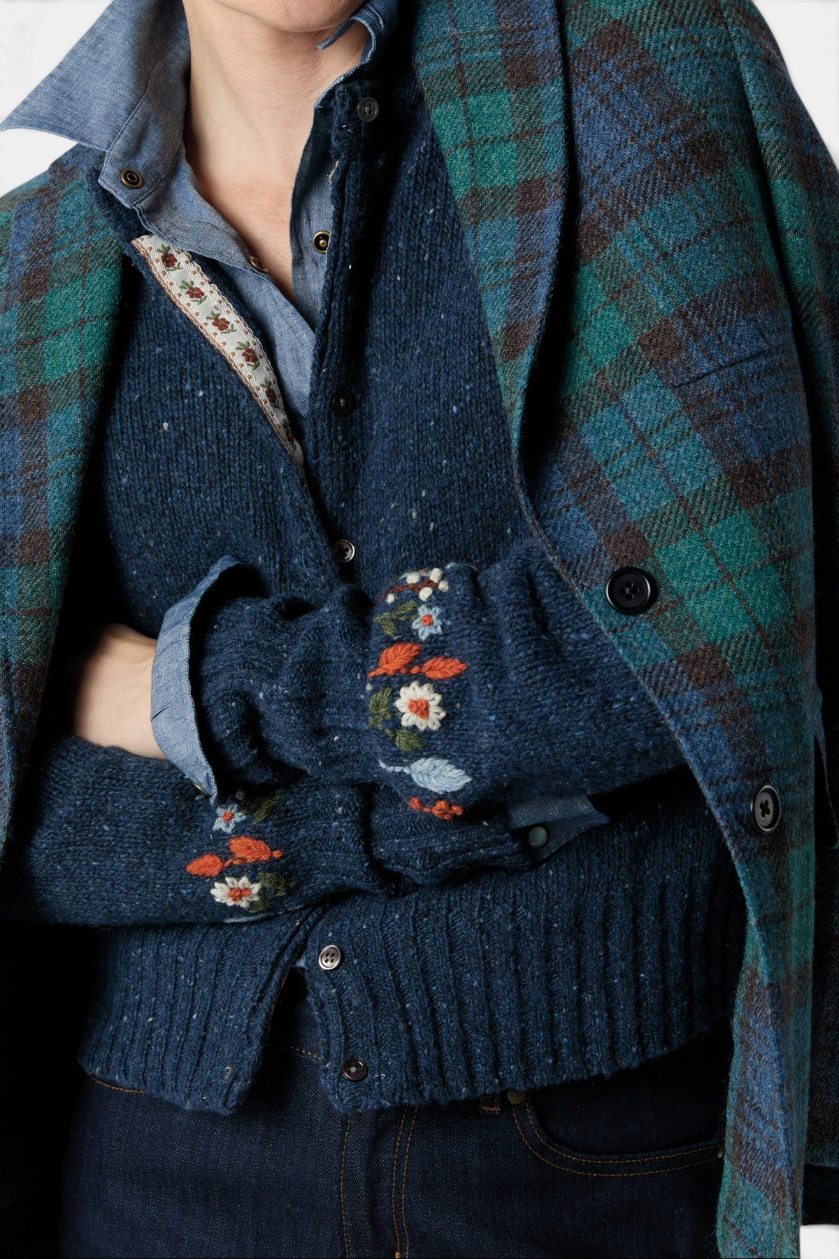 The Copper Shed Romy navy blue donegal wool and alpaca cardigan with floral embroidery on the cuffs and ribbon detail