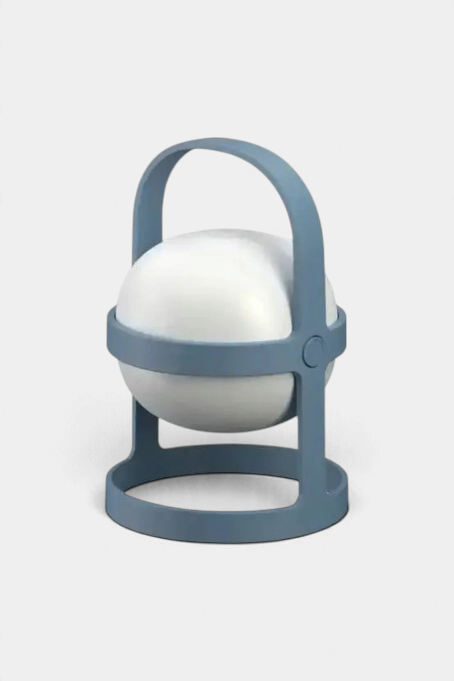 The Copper Shed Rosendahl Soft Spot solar lantern with a blue recycled plastic frame and white spherical light globe.