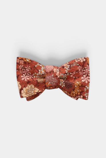 The Copper Shed handcrafted Liberty of London bow tie in a warm rust and orange floral print cotton fabric.